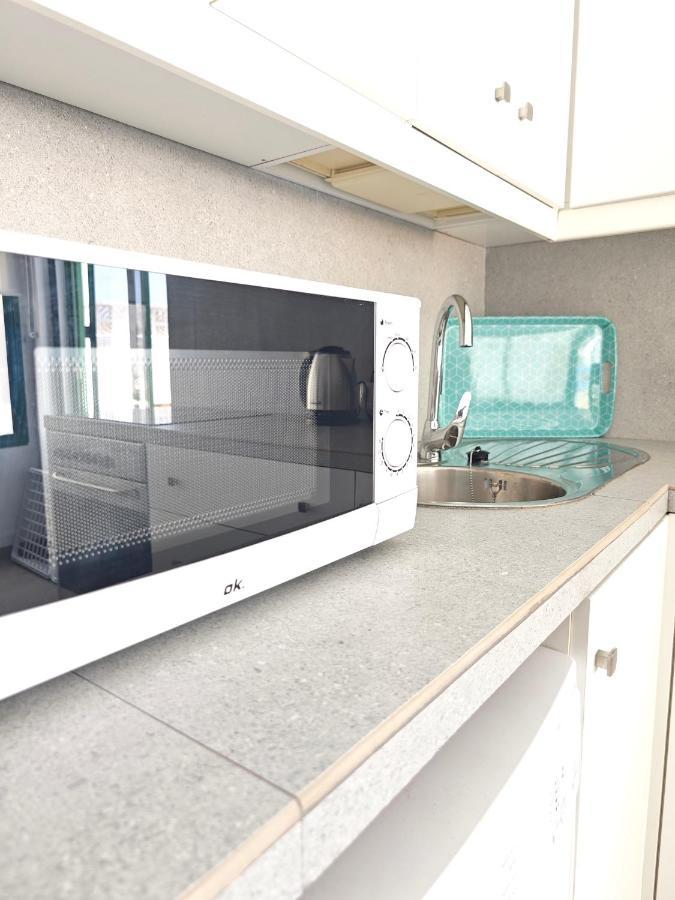 Cozy Apartment In Front Of The Natural Pools El Pris Bagian luar foto